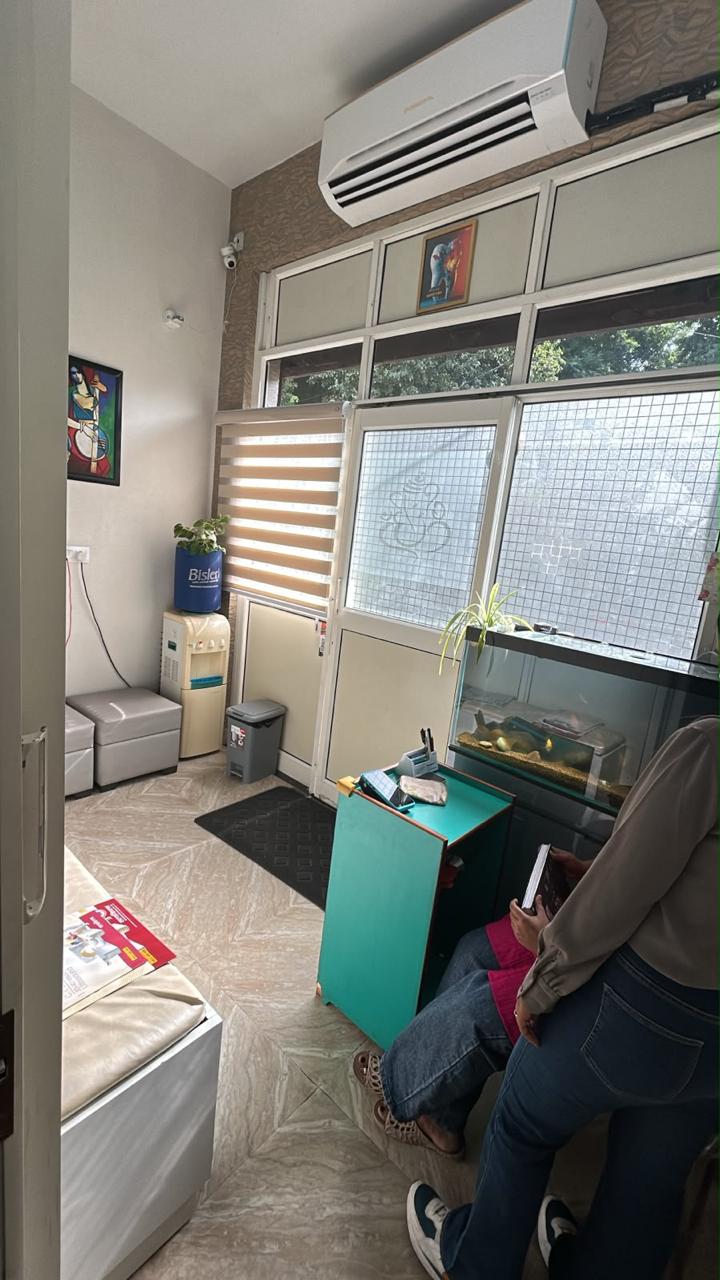 Clinic reception corner with fish tank and seating